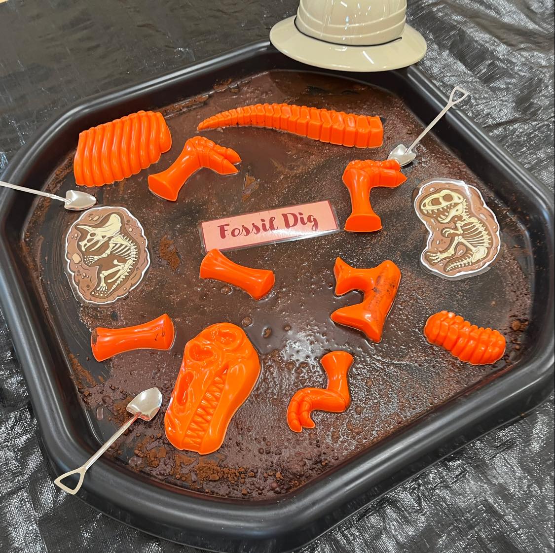 Child painting with bright colours